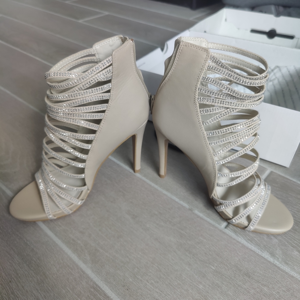 Aldo Czarnecki cream colored rinestone strappy heels. Size 7